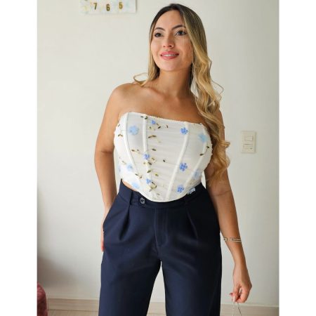 conjunto de fiesta corset bustier bordado azul y dorado con flores, y pantalón maxi tiro alto. corset con tirantes ajustables. jessi boutique.