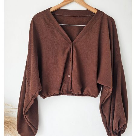 blusa para mujer en material capri con resorte en cintura y puños. blusa de manga larga fresca y elegante disponible en colores pasteles y neutros. moda femenina jessi boutique