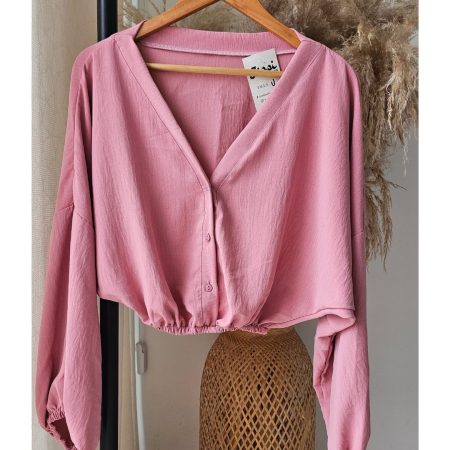 blusa para mujer en material capri con resorte en cintura y puños. blusa de manga larga fresca y elegante disponible en colores pasteles y neutros. moda femenina jessi boutique