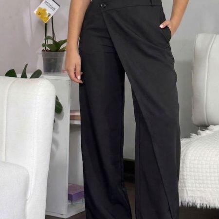 Pantalón sastre para mujer tiro alto. Pantalón Nara en lino noche de viena beige y negro. Pantalón de bota ancha elegante con botones asimétricos. Moda formal femenina Jessi Boutique